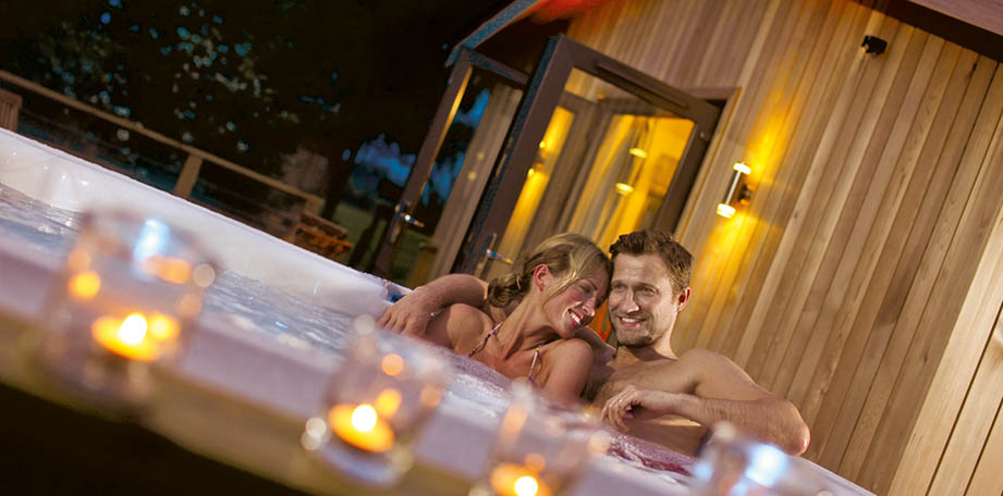 Couple relaxing in hot tub